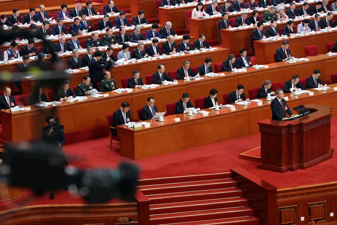 Chinese Premier Li Qiang (right) said the government will take “solid steps to implement policies and measures designed to spur the growth of the private sector”.