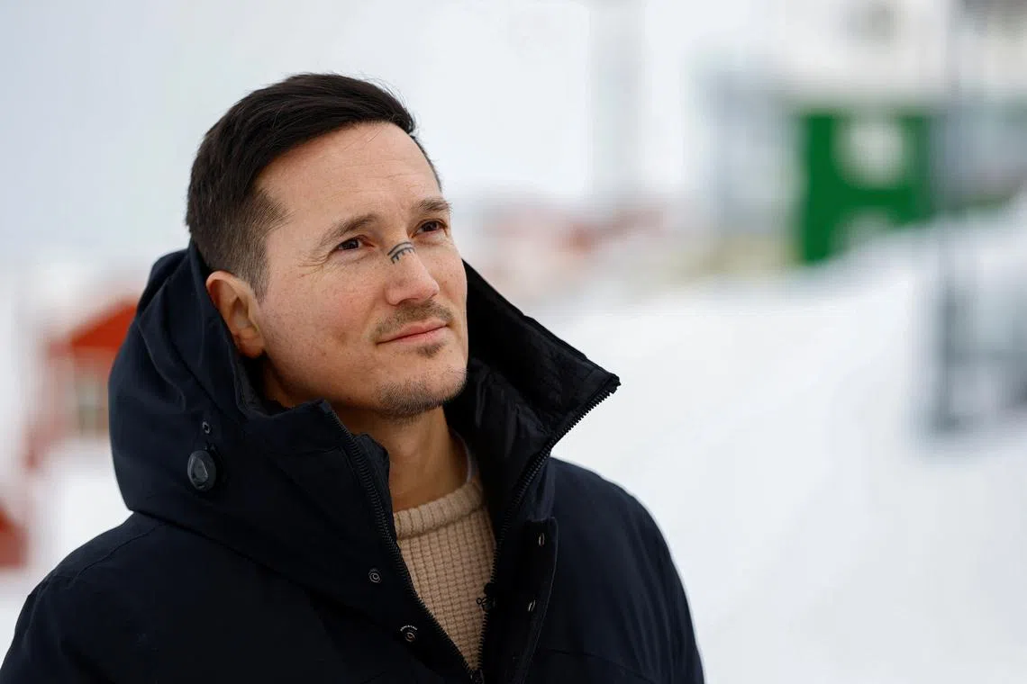 Candidate Juno Berthelsen for Naleraq party poses during an interview with Reuters in Nuuk, Greenland, February 7, 2025. REUTERS/Sarah Meyssonnier