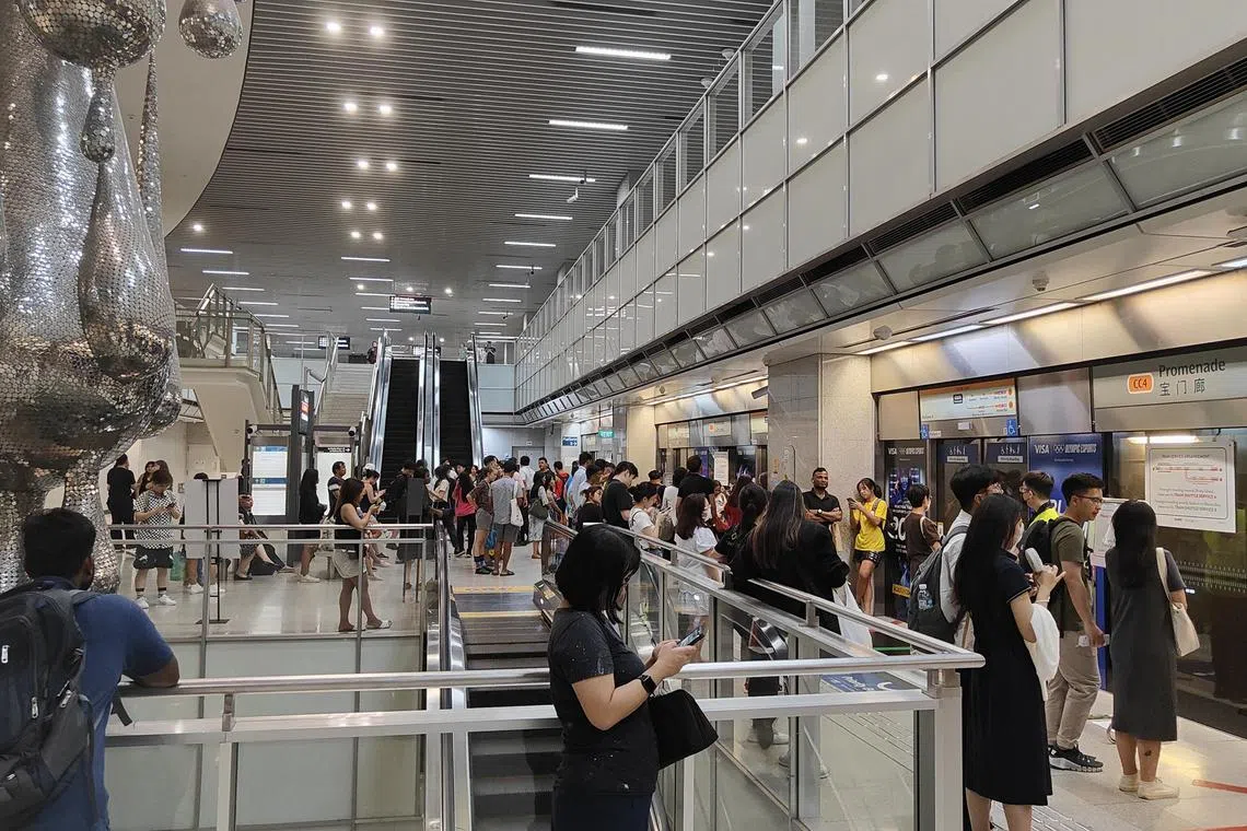 Many commuters were waiting for the shuttle service at Promenade station.