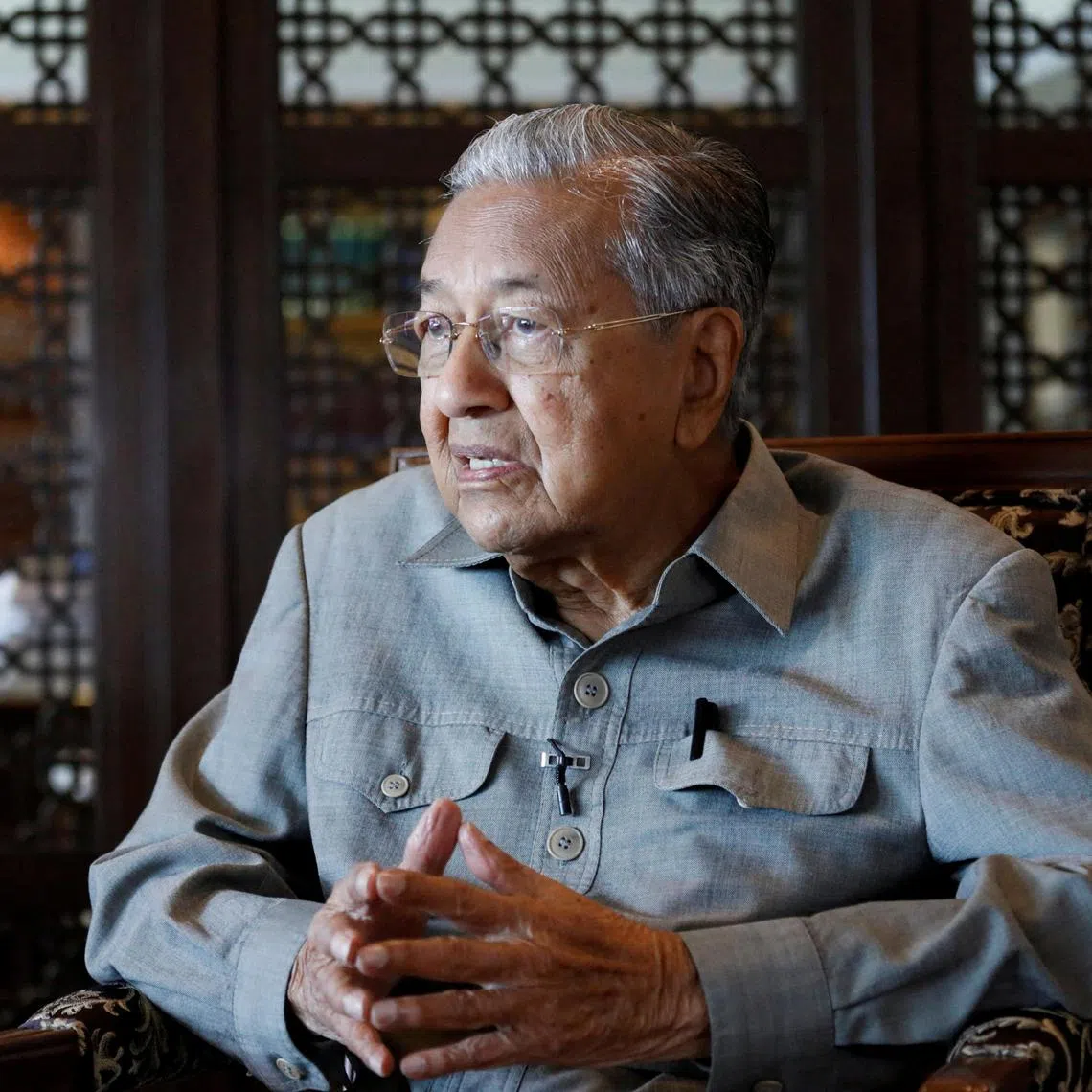 FILE PHOTO: Former Malaysian Prime Minister Mahathir Mohamad speaks during an interview with Reuters in Putrajaya, Malaysia November 8, 2022. REUTERS/Hasnoor Hussain/File Photo