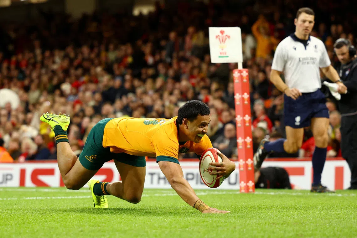 Rugby Union - Autumn Internationals - Wales v Australia - Millennium Stadium, Cardiff, Wales, Britain - November 17, 2024 Australia's Len Ikitau scores a try Action Images via Reuters/Matthew Childs
