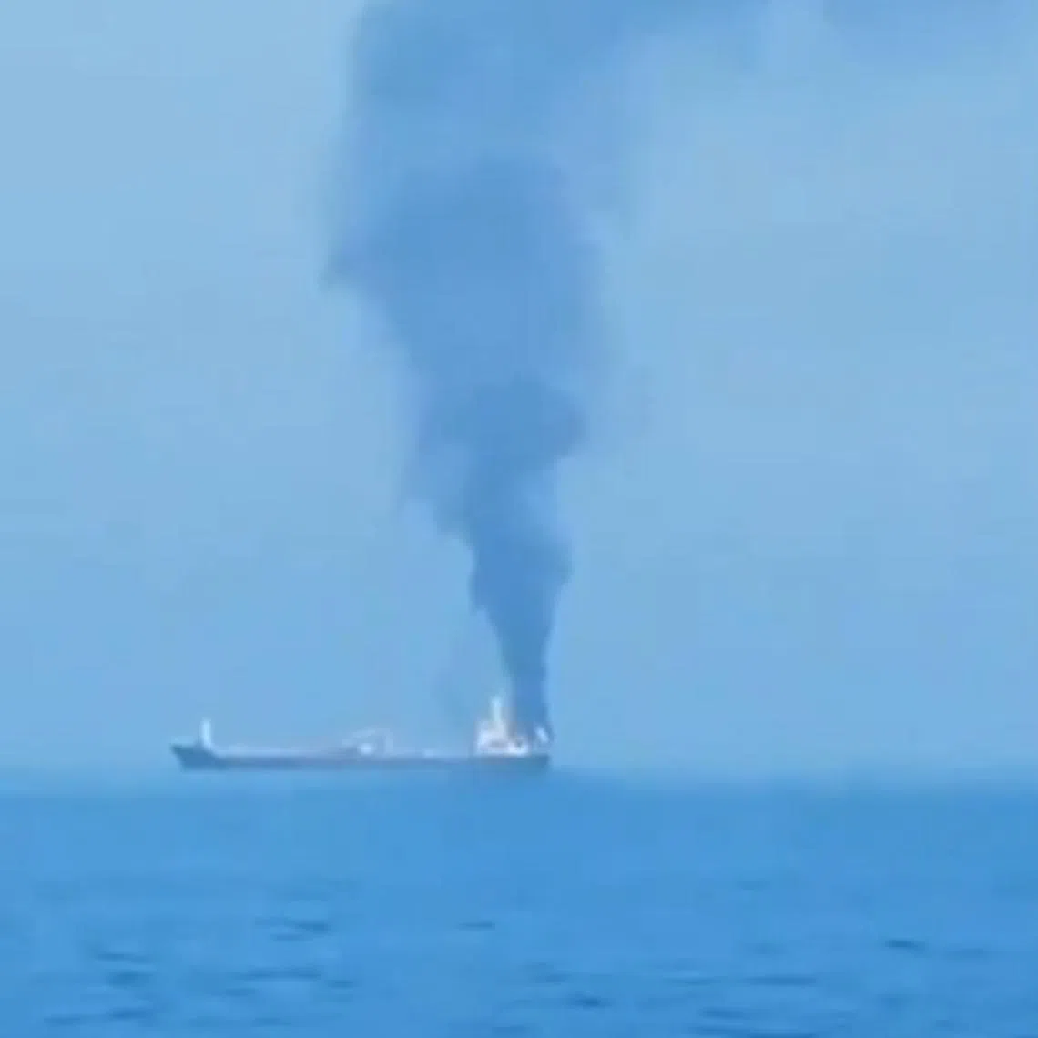 Screenshots from video footage posted online that is said to show the Jalveer tanker being fired upon by the US off the coast of Oman.