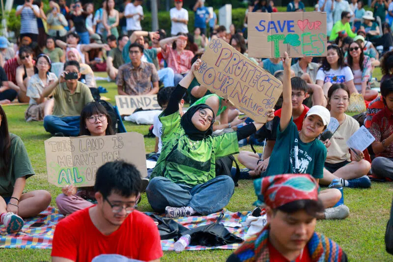Attendees holding signs and placards at the Maju for the People Rally at Hong Lim Park on Aug 16. Wishing away land-use trade-offs is no substitute for rigorous debate, the writer says.