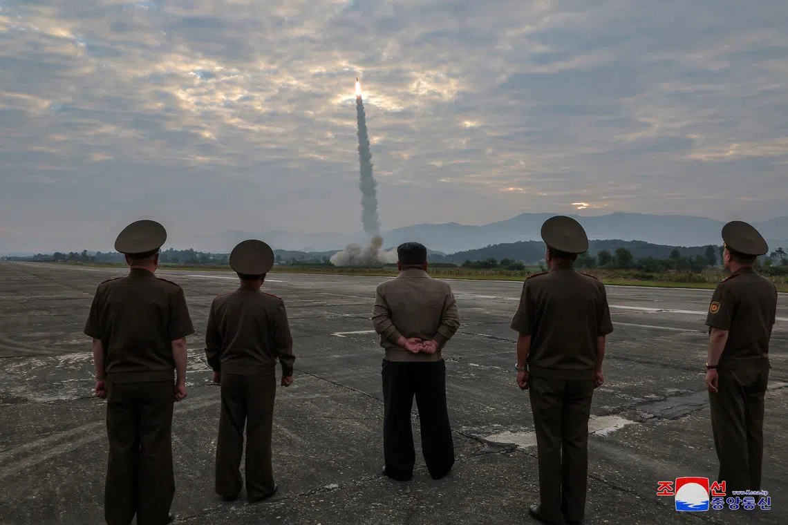 North Korean leader Kim Jong-un looks on during the test of what KCNA described as a new tactical ballistic missile, in this picture obtained by Reuters on September 19, 2024, in North Korea.    KCNA via REUTERS