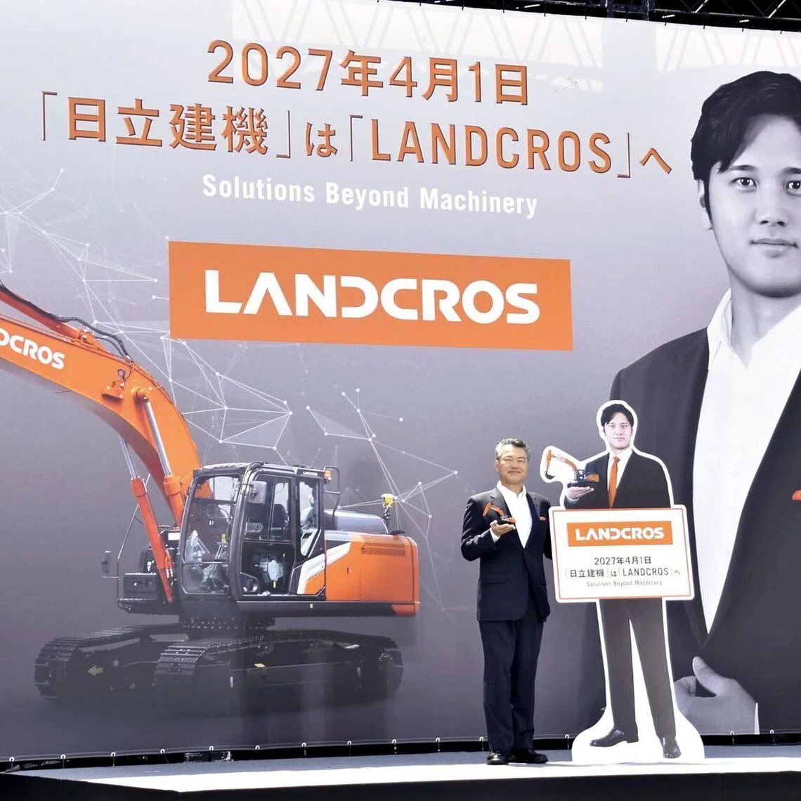 Hitachi Construction Machinery president Masafumi Senzaki announcing the company’s upcoming name change on Aug 4.