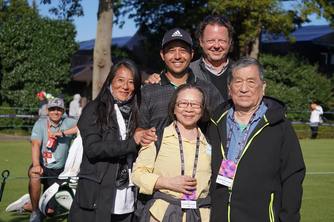 American golfer Xander Schauffele is pictured with his parents and grandparents.


