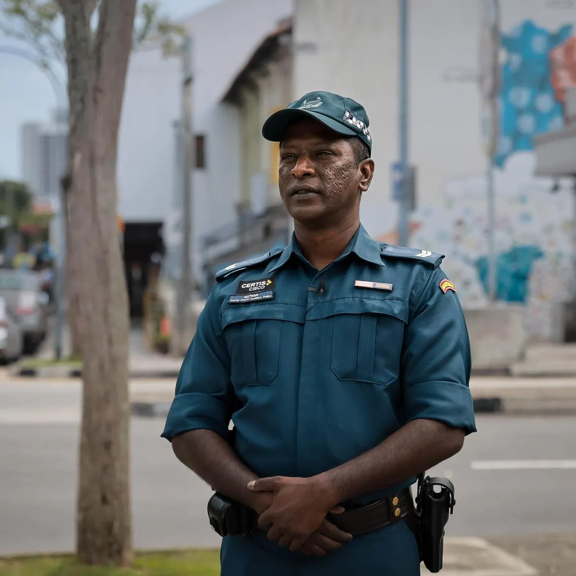 Certis officer Corporal Nathan Chandra Sekaran, 44, at Race Course Road above Little India MRT Station, Oct 25, 2023. He was one of the first responders during the Little India riot which happened 10 years ago.