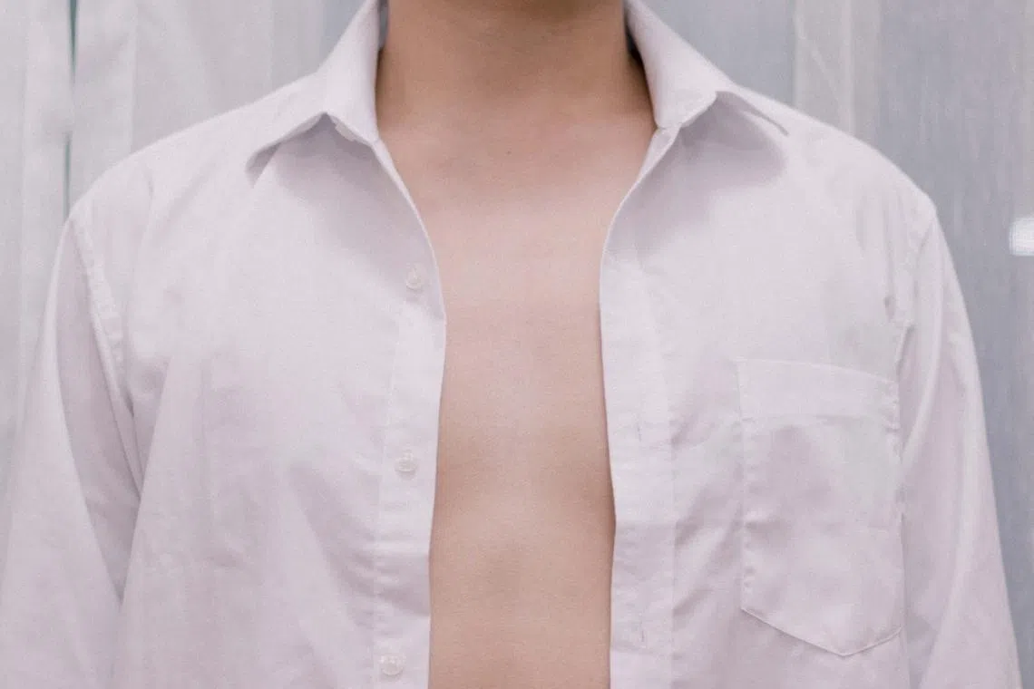 Men with gynecomastia may feel self-conscious because of their enlarged breasts.