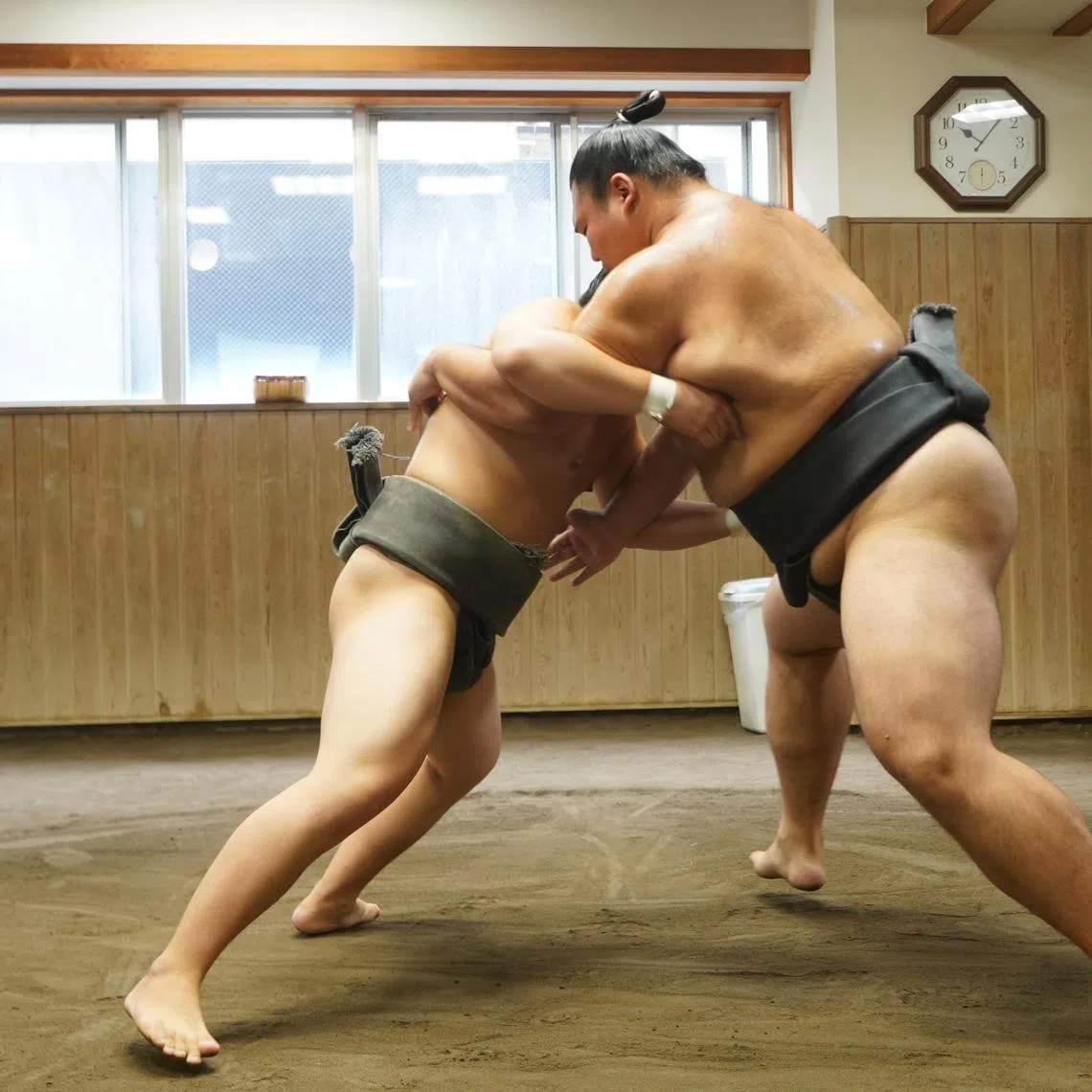 ST has chronicled Japan’s transformation over the years. By the 1910s, features introduced readers to the rich traditions of sumo wrestling (above). Today, the country remains a compelling, evolving story, says the writer.