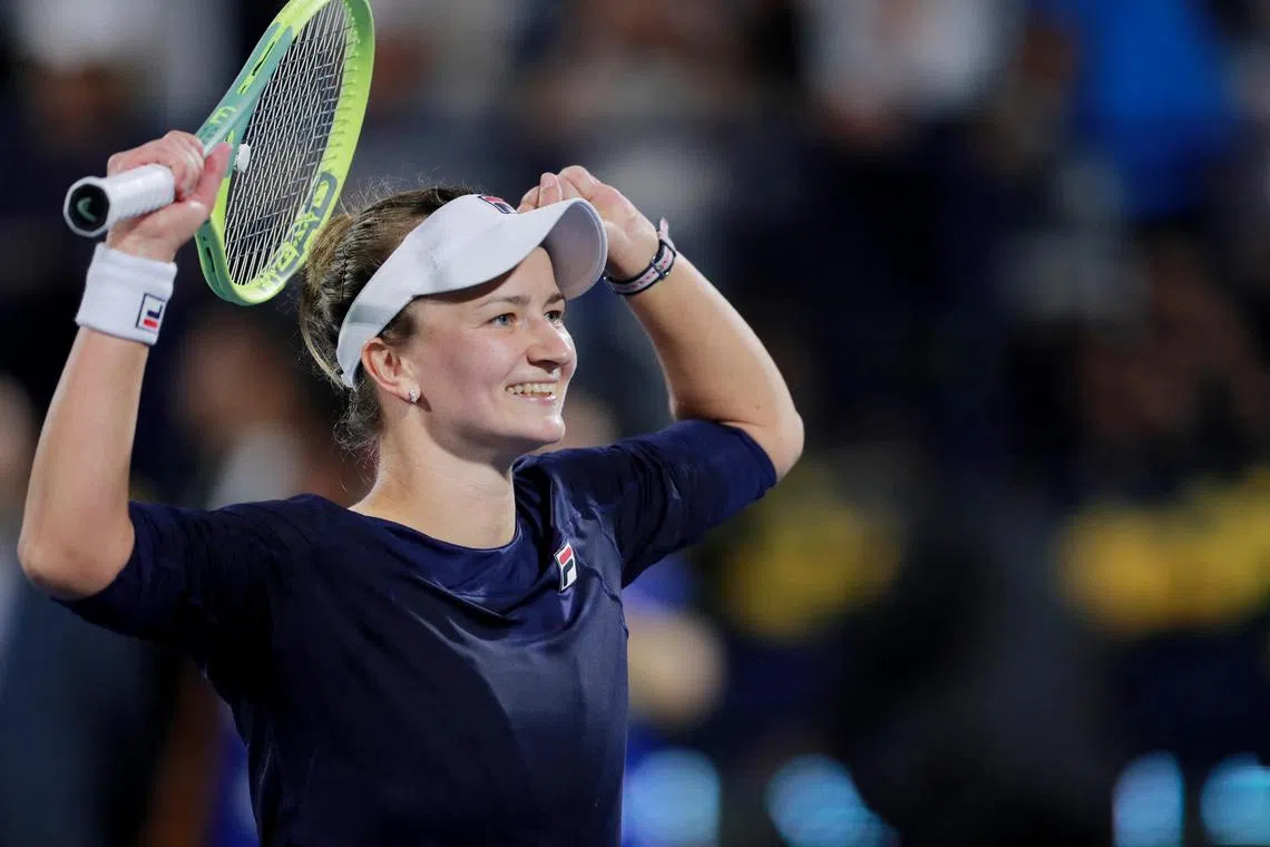 Barbora Krejcikova celebrates her win against Poland's Iga Swiatek.