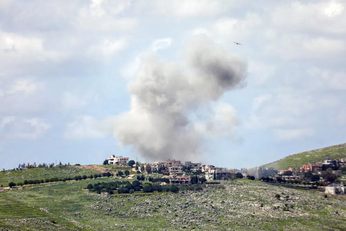 Smoke rises after an Israeli strike, amid escalating hostilities between Israel and Hezbollah, as the U.S.-Israeli conflict with Iran continues, in southern Lebanon, March 24, 2026.