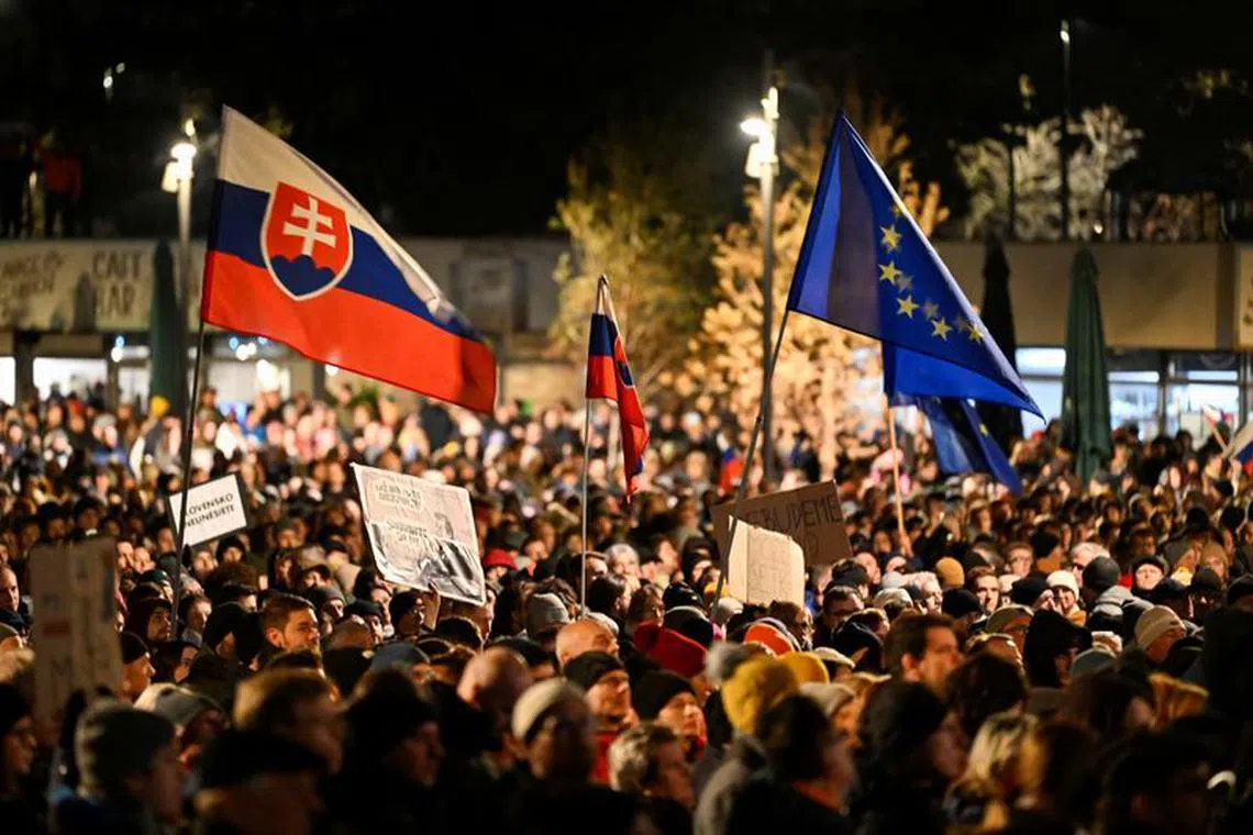 Demonstrators take part in a protest against the government's plan to scrap a special prosecutor's office, in Bratislava, Slovakia, December 12, 2023. REUTERS/Radovan Stoklasa
