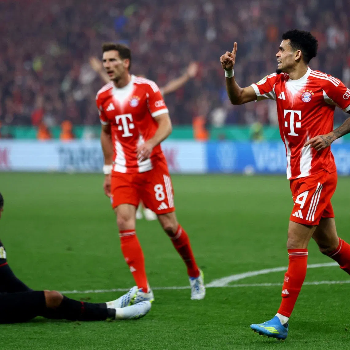 Soccer Football - DFB Cup - Semi Final - Bayer Leverkusen v Bayern Munich - BayArena, Leverkusen, Germany - April 22, 2026  Bayern Munich's Luis Diaz reacts after scoring a disallowed goal but it was later awarded after a VAR review REUTERS/Thilo Schmuelgen