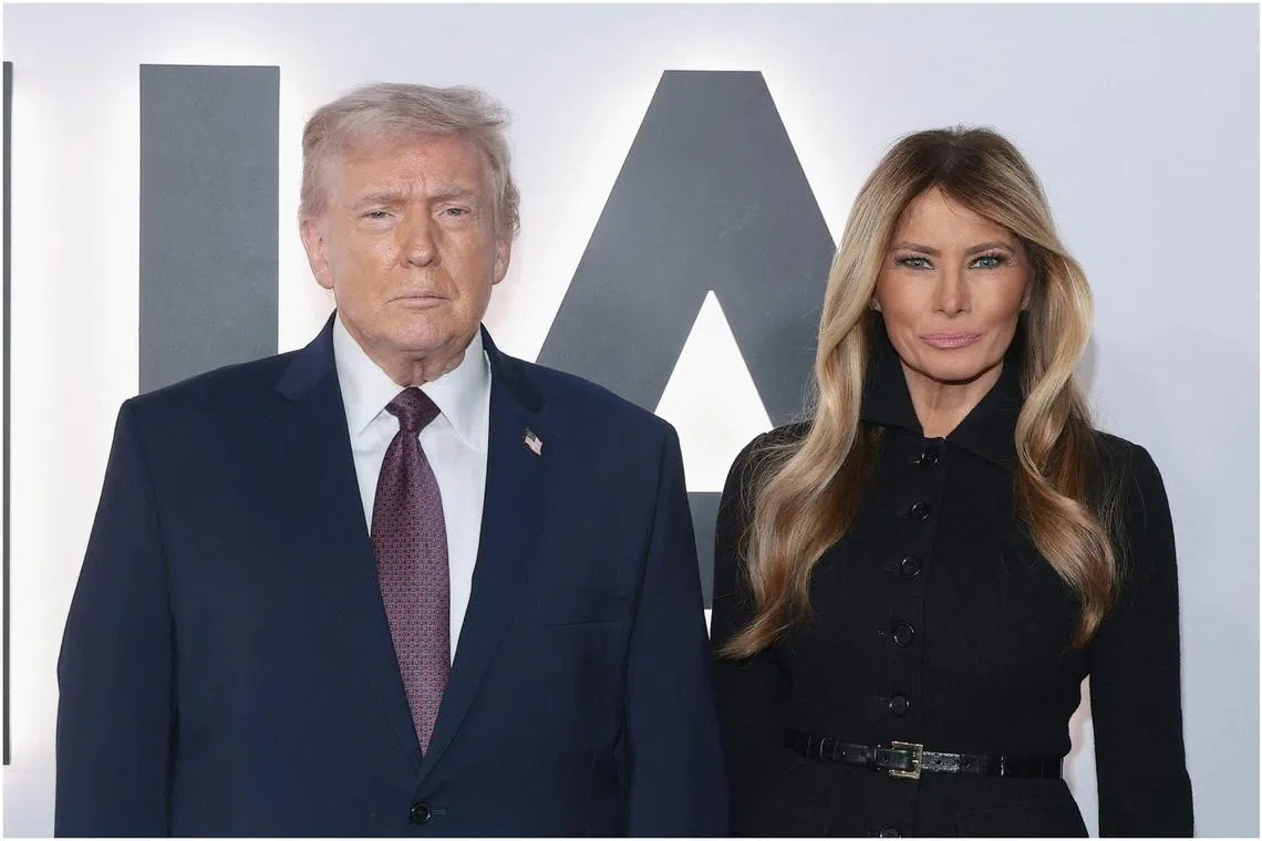 US President Donald Trump (left) and First Lady Melania Trump attend the premiere of Amazon MGM's documentary Melania in Washington on Jan 29.