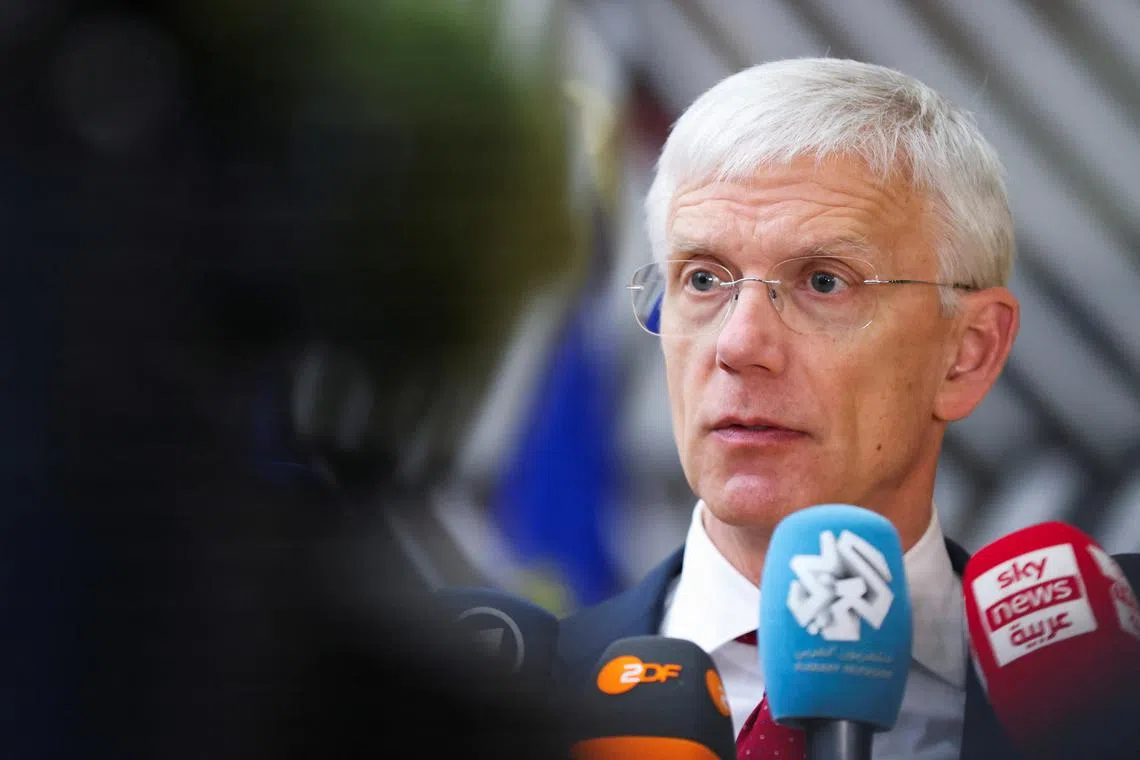 FILE PHOTO: Latvian Foreign Minister Krisjanis Karins speaks to members of the media as he attends a European Union Foreign Ministers' meeting in Brussels, Belgium March 18, 2024. REUTERS/Johanna Geron/ File photo