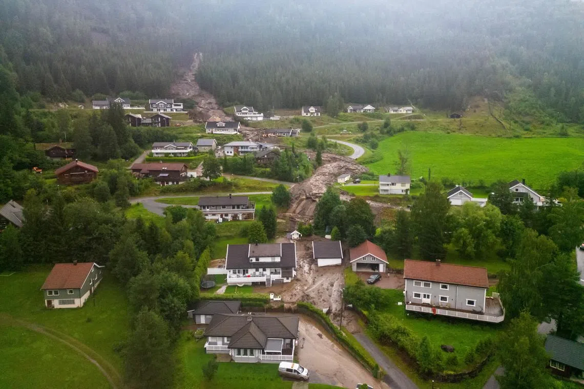 A view shows damaged residential buildings hit by an avalanche due to extreme weather near Oslo, Norway.