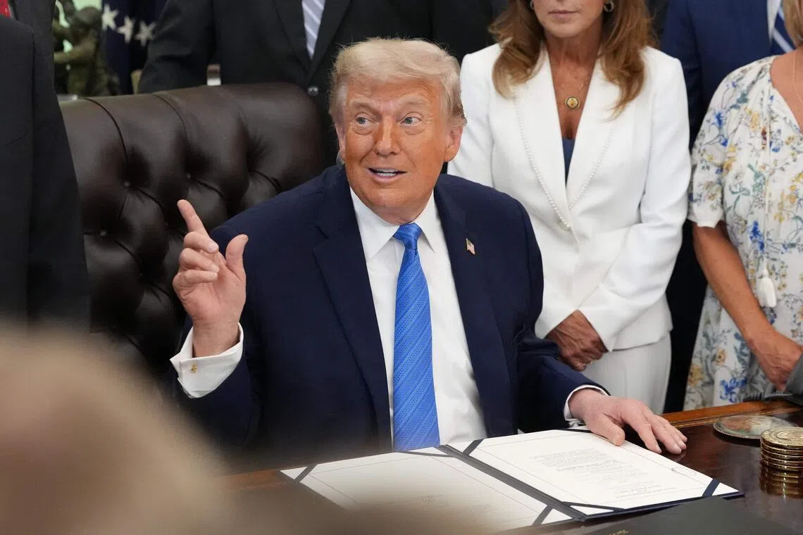 US President Donald Trump speaks during a signing ceremony for the "Secure America Act" in the Oval Office of the White House in Washington, DC, on June 10, 2026. The bill provides around $38 billion for Immigration and Customs Enforcement (ICE), $26 billion for Border Patrol and another $5 billion for unforeseen costs, effectively ensuring a steady flow of money for Trump's deportation agenda through fiscal 2029. (Photo by Ken Cedeno / AFP)