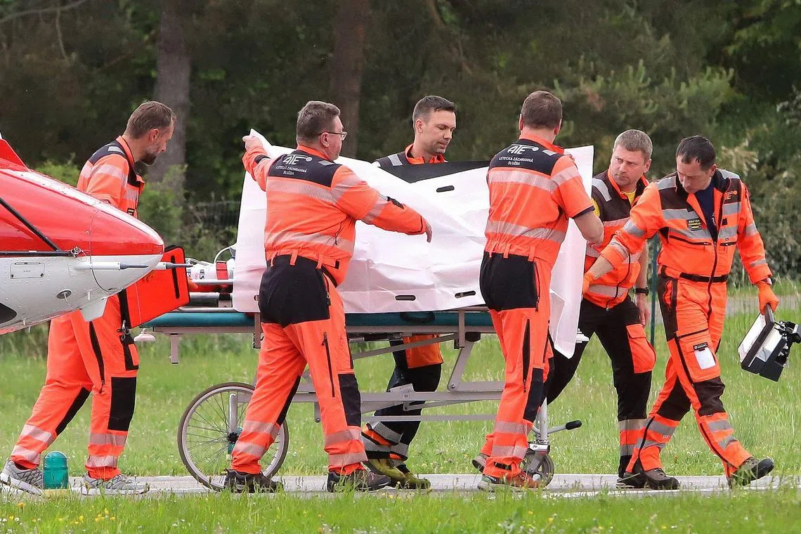 Slovak Prime Minister Robert Fico being transported from a helicopter by medics to the hospital in Banska Bystrica, Slovakia after he had been shot multiple times on May 15, 2024