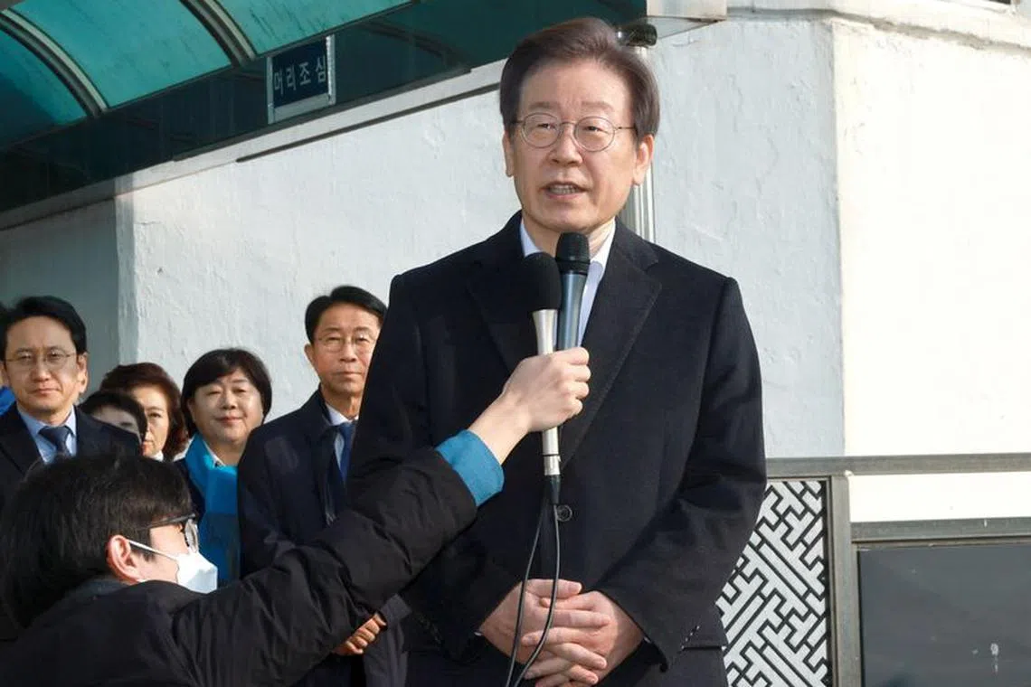South Korea's opposition Democratic Party leader Lee Jae-myung speaks after being discharged at Seoul National University Hospital in Seoul, South Korea, January 10, 2024.   Yonhap via REUTERS