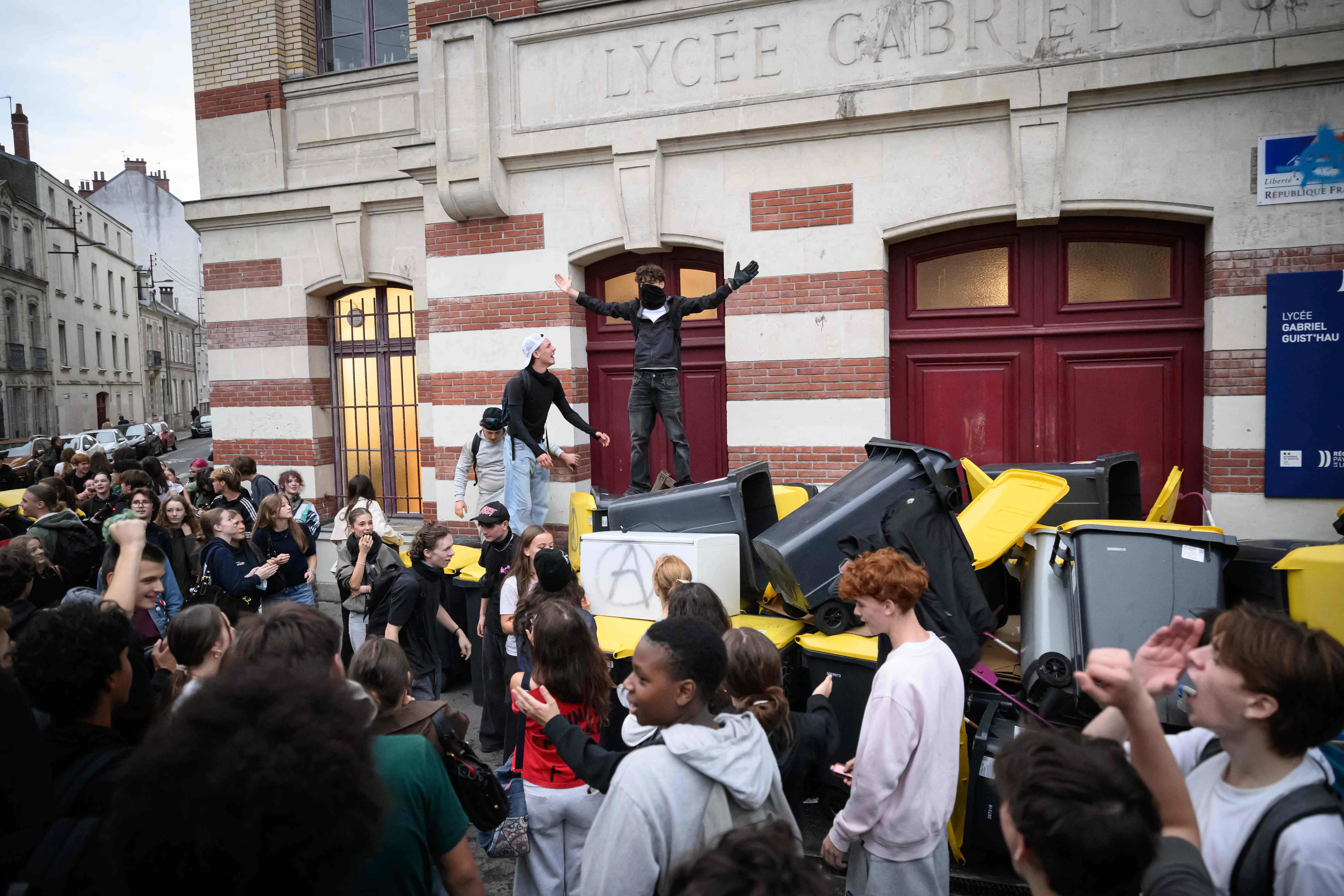 Students blockading the entrance to a secondary school in Nantes, western France, on Sept 29. Students have staged protests outside hundreds of schools in France over grievances including timetables, class sizes and a shortage of teachers, as well as overheated classrooms during this year’s heatwaves.