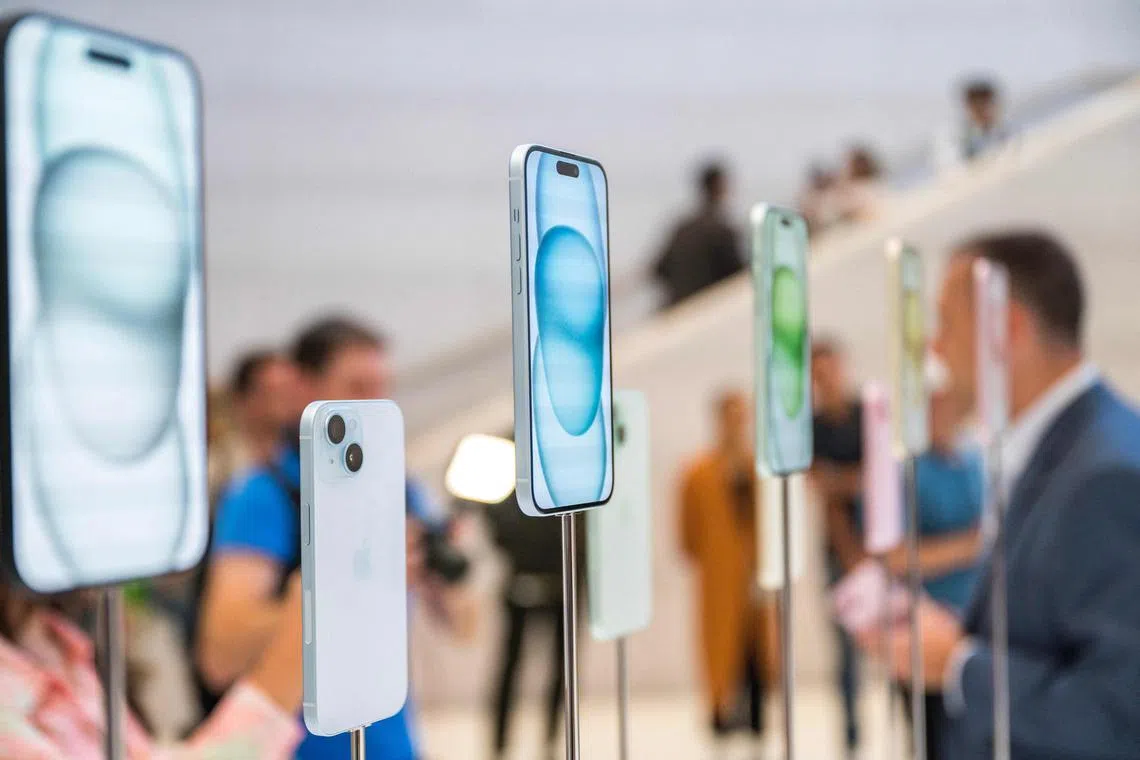 The new Apple iPhone 15, with EU ordered USB-C charger, is displayed amongst other new products during a launch event at Apple Park in Cupertino, California.