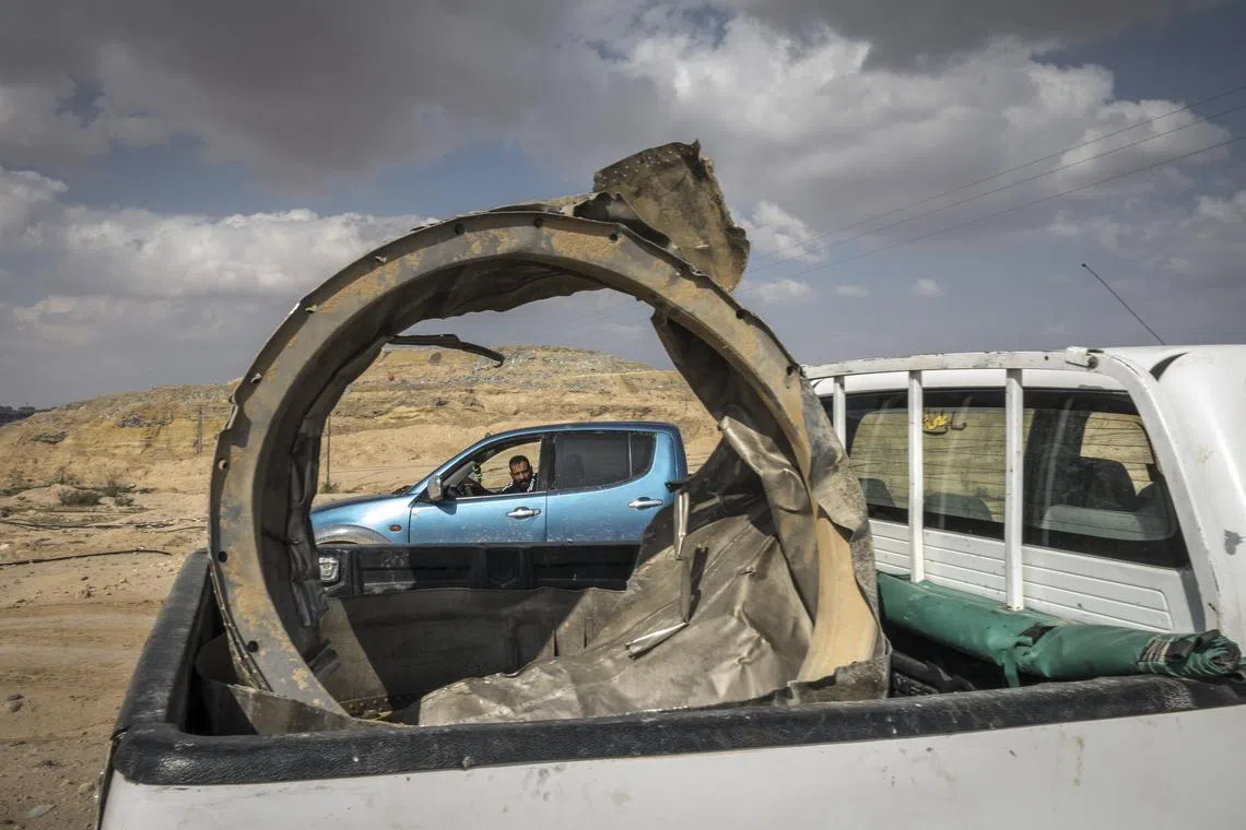 Pieces of an Iranian missile in a pickup truck outside Arad, Israel, on April 14, 2024.