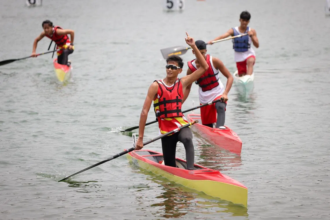 Hwa Chong Institution's Hayden Lam Hao En celebrates coming in first in the B-Boys C1-500m category at the National School Games Canoeing Championships 2023 held at MacRitchie Reservoir, April 13, 2023.