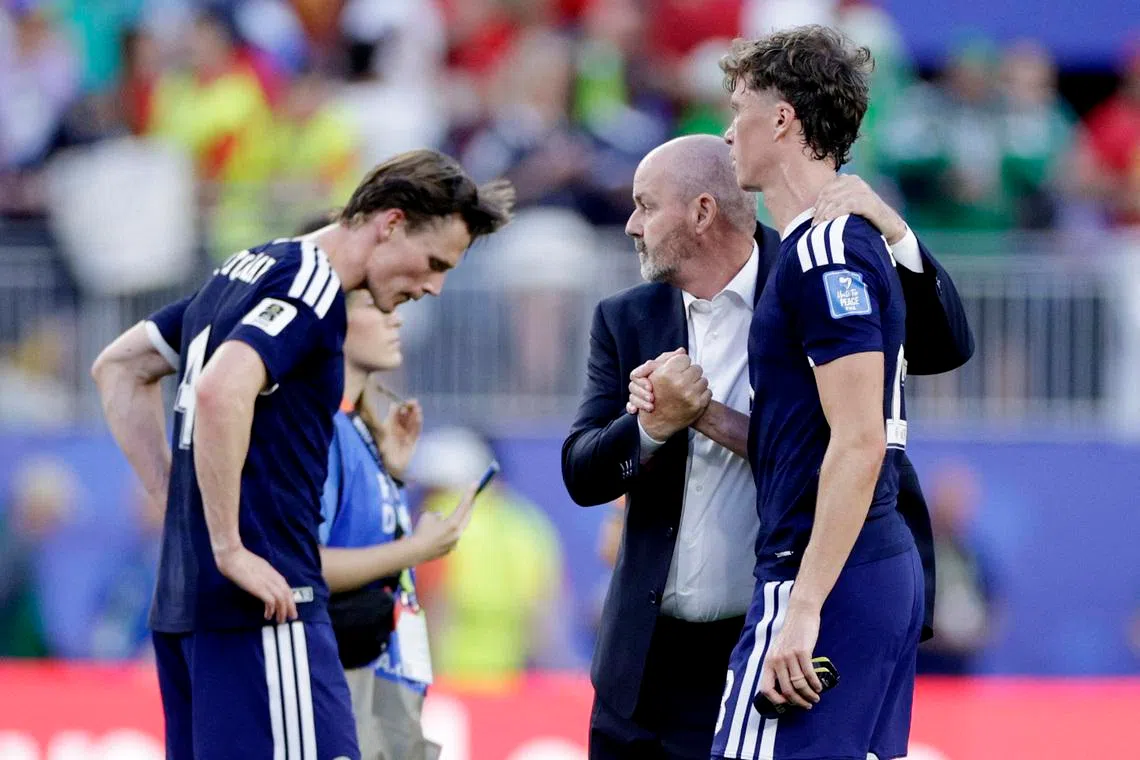 Soccer Football - FIFA World Cup 2026 - Group C - Scotland v Morocco - Boston Stadium, Foxborough, Massachusetts, U.S. - June 19, 2026 Scotland manager Steve Clarke, Jack Hendry and Scott McTominay look dejected after the match REUTERS/Pilar Olivares