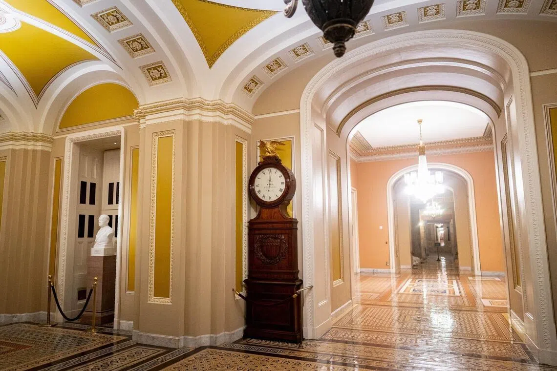 The Ohio Clock after striking midnight at the US Capitol in Washington, on Oct 1. 