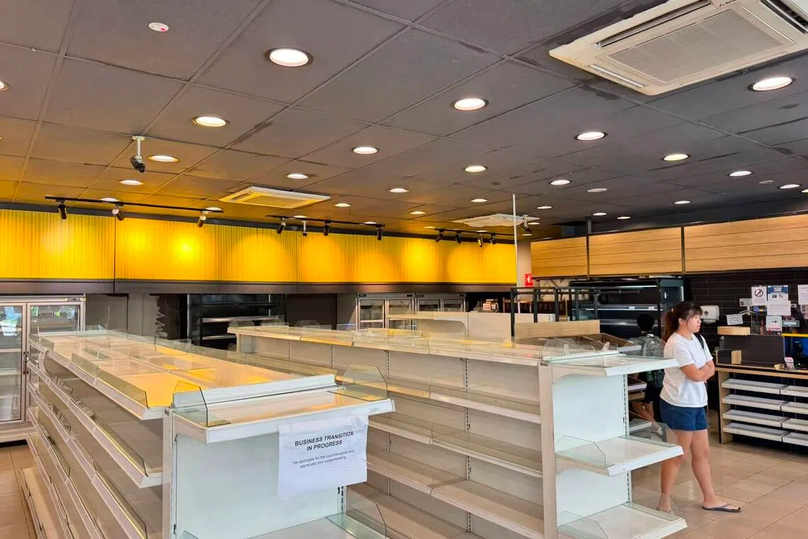 Empty shelves seen at the FairPrice convenience store at the Esso petrol station in Braddell.