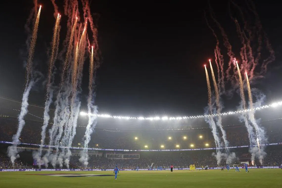Cricket - ICC Cricket World Cup 2023 - Final - India v Australia - Narendra Modi Stadium, Ahmedabad, India - November 19, 2023 General view as fireworks are let off as Australia players celebrate after winning the ICC Cricket World Cup REUTERS/Adnan Abidi