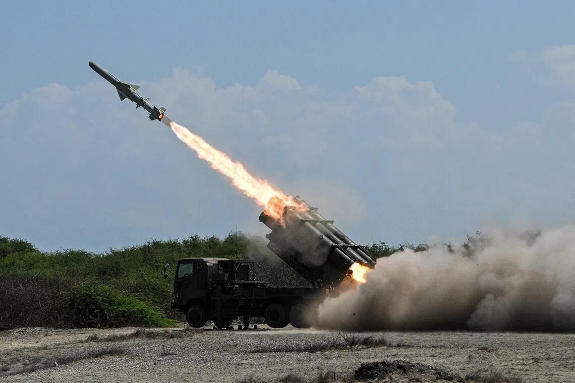 A Japan Ground Self-Defense Force (JGSDF) Type 88 surface-to-ship missile launcher fires during the Joint Task Force (JTF) Maritime Strike, part of the Balikatan joint military exercises between the United States and the Philippines in Ilocos Norte province.