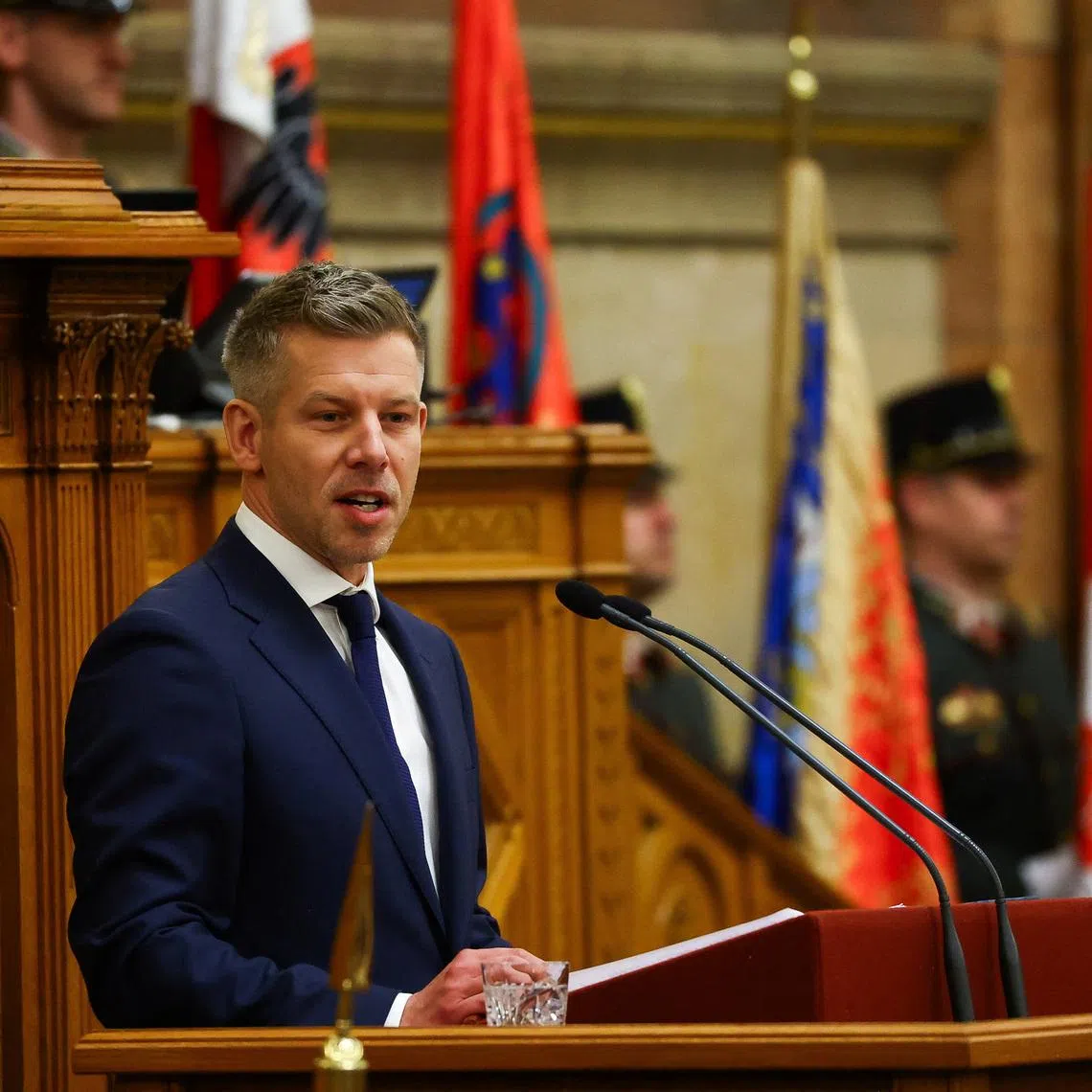 Hungarian Prime Minister Peter Magyar delivers a speech on the day new members of government take their oath of office in the Parliament, in Budapest, Hungary, May 12, 2026. REUTERS/Bernadett Szabo