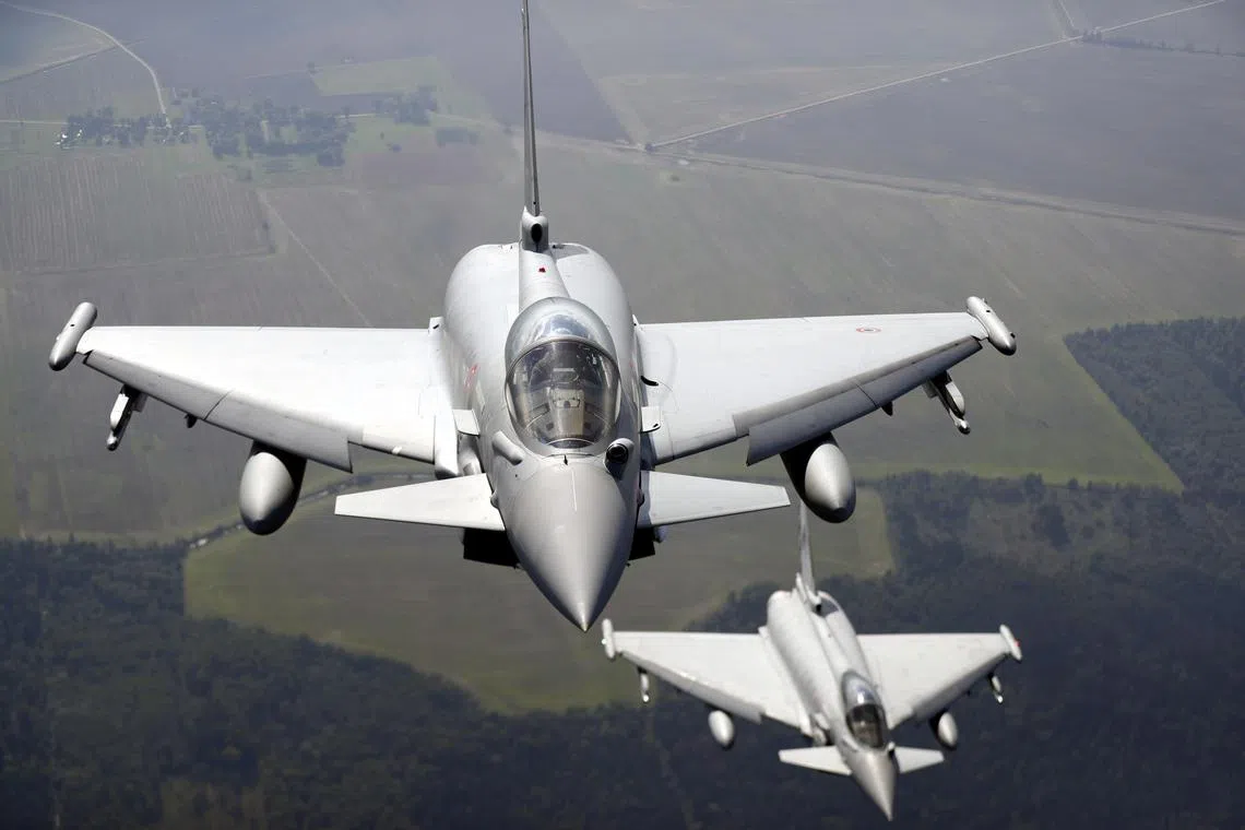 Italian Air Force Eurofighter jets participating in NATO's Baltic Air Policing Mission in Lithuanian airspace near Siauliai, Lithuania on Sept 12.