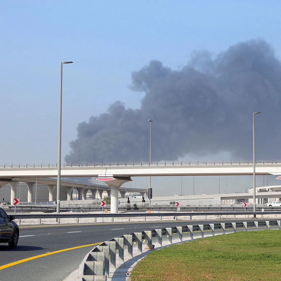 Smoke billows from Jebel Ali port after an Iranian attack, following United States and Israel strikes on Iran, in Dubai, United Arab Emirates, March 1, 2026. REUTERS/Raghed Waked     TPX IMAGES OF THE DAY
