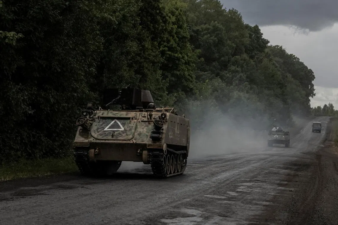 Ukrainian soldiers ride armoured personnel carriers, amid Russia's attack on Ukraine, near the Russian border in Sumy region, Ukraine August 13, 2024. REUTERS/Viacheslav Ratynskyi/File Photo