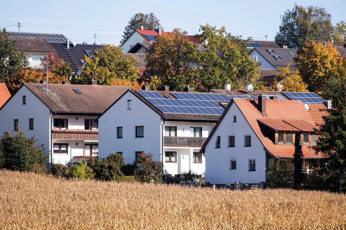 Photovoltaic panels are seen on the roofs of buildings located in Mainburg, north-west of the Bavarian capital Munich, Germany, October 20, 2021. REUTERS/Lukas Barth