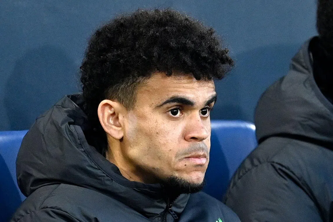 Liverpool fans warmly serenaded and applauded Luis Diaz as he warmed up at Kenilworth Road stadium before kickoff.