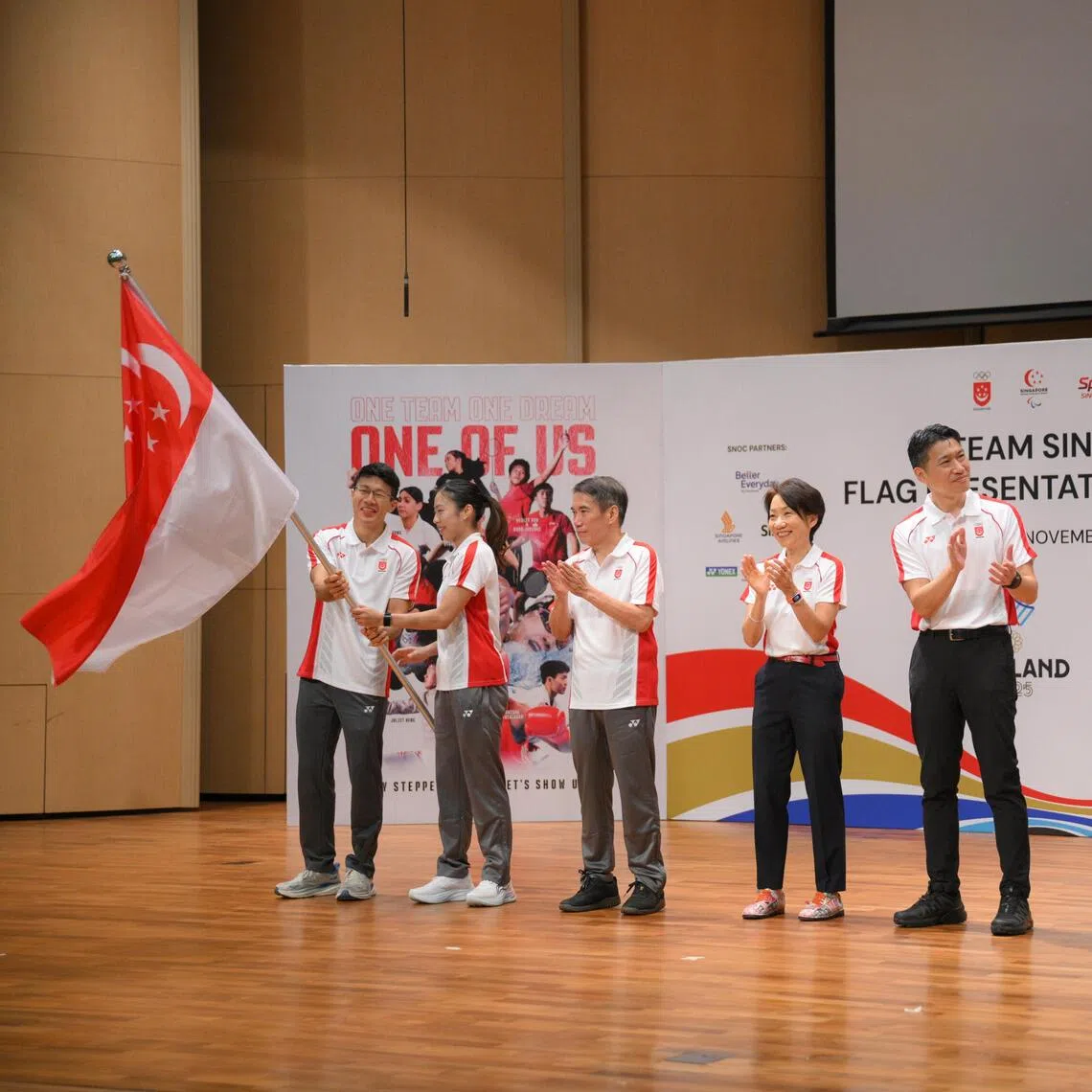 (From left), Singapore flag bearers Noah Lim and Yeo Jiamin, SEA Games chef de mission Lawrence Leow, Singapore National Olympic Council president Grace Fu, Acting Minister for Culture, Community and Youth David Neo, Asean Para Games chef de mission Gary Chong and Singapore flagbearer Joan Hung.