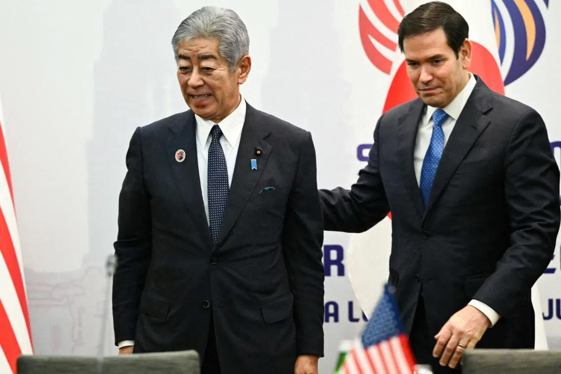 Japan’s Foreign Minister Takeshi Iwaya and US Secretary of State Marco Rubio arrive for a meeting with South Korea's Vice Foreign Minister Park Yoonjoo (not pictured) on the sidelines of the ASEAN Foreign Ministers’ Meeting at the Kuala Lumpur Convention Centre in Kuala Lumpur, Malaysia July 11, 2025.     MANDEL NGAN/Pool via REUTERS