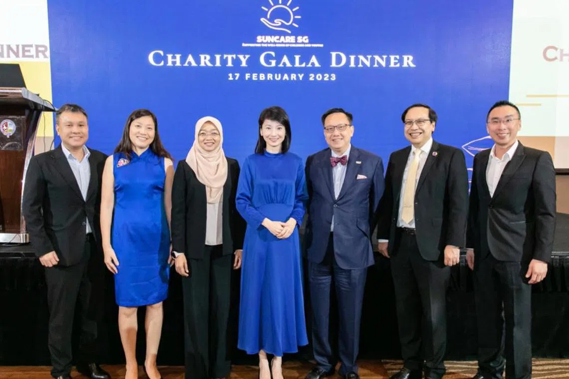 Board members of Suncare SG with the charity's advisor, Minister of State for Social and Family Development Sun Xueling (centre), at its fundraising gala dinner on Feb 17, 2022.