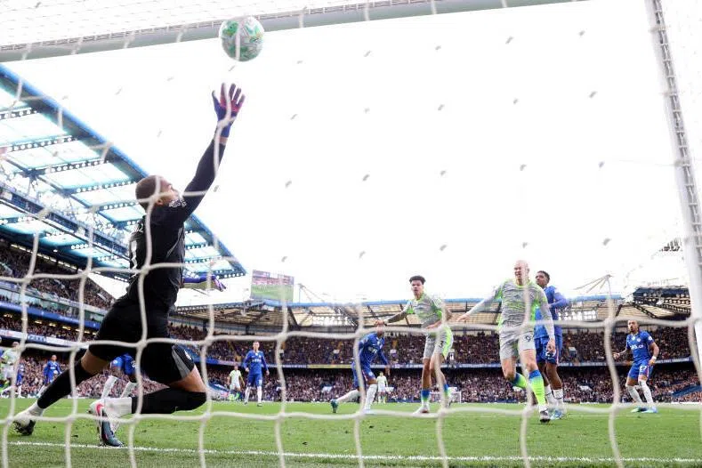 Nico O'Reilly heads the ball home to score Manchester City's first goal in the 51st minute.