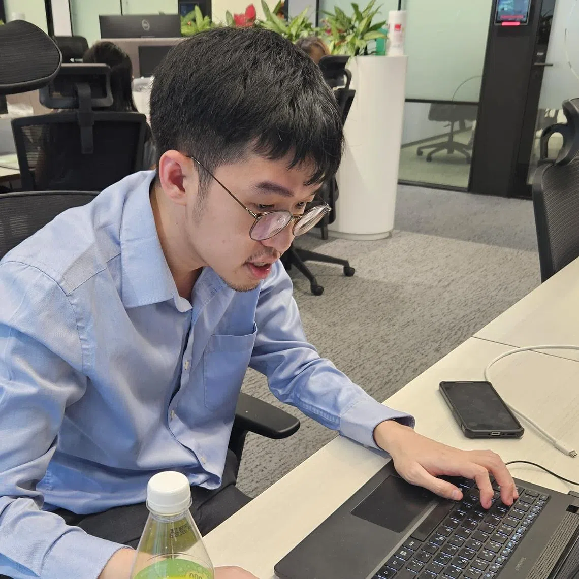 Mr Chua Teng Sheng (left) and Mr Cedrick Chia exemplify how individuals on the autism spectrum can contribute meaningfully to the workforce.