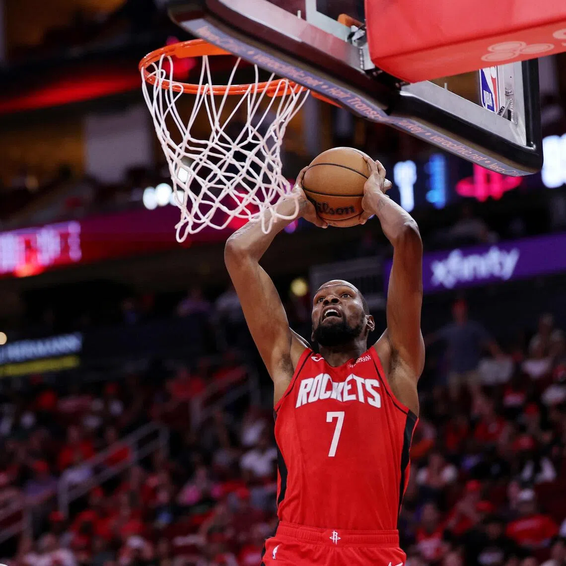 Kevin Durant of the Houston Rockets dunks the ball against the Detroit Pistons during the second half at Toyota Centre.
