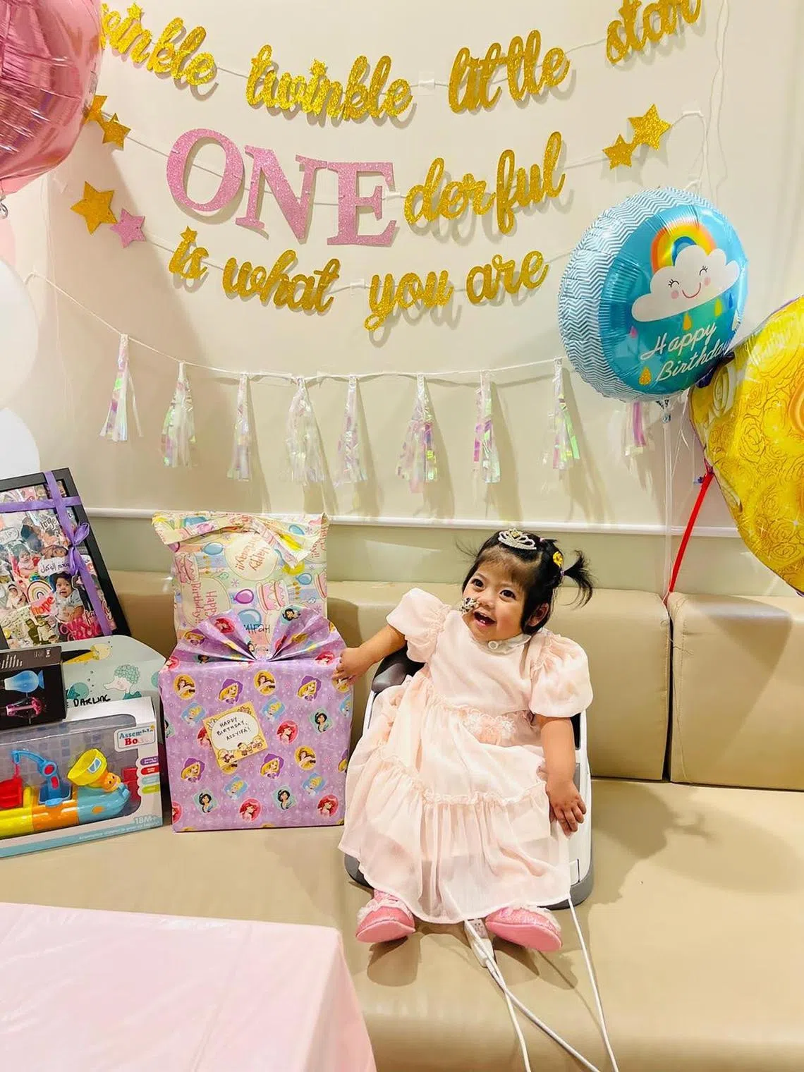 akgirl07 - Nur Faathimah Assyifa celebrating her first birthday in the NUH ward on 27 July 2021. Credit: Nur Syahidah Watib