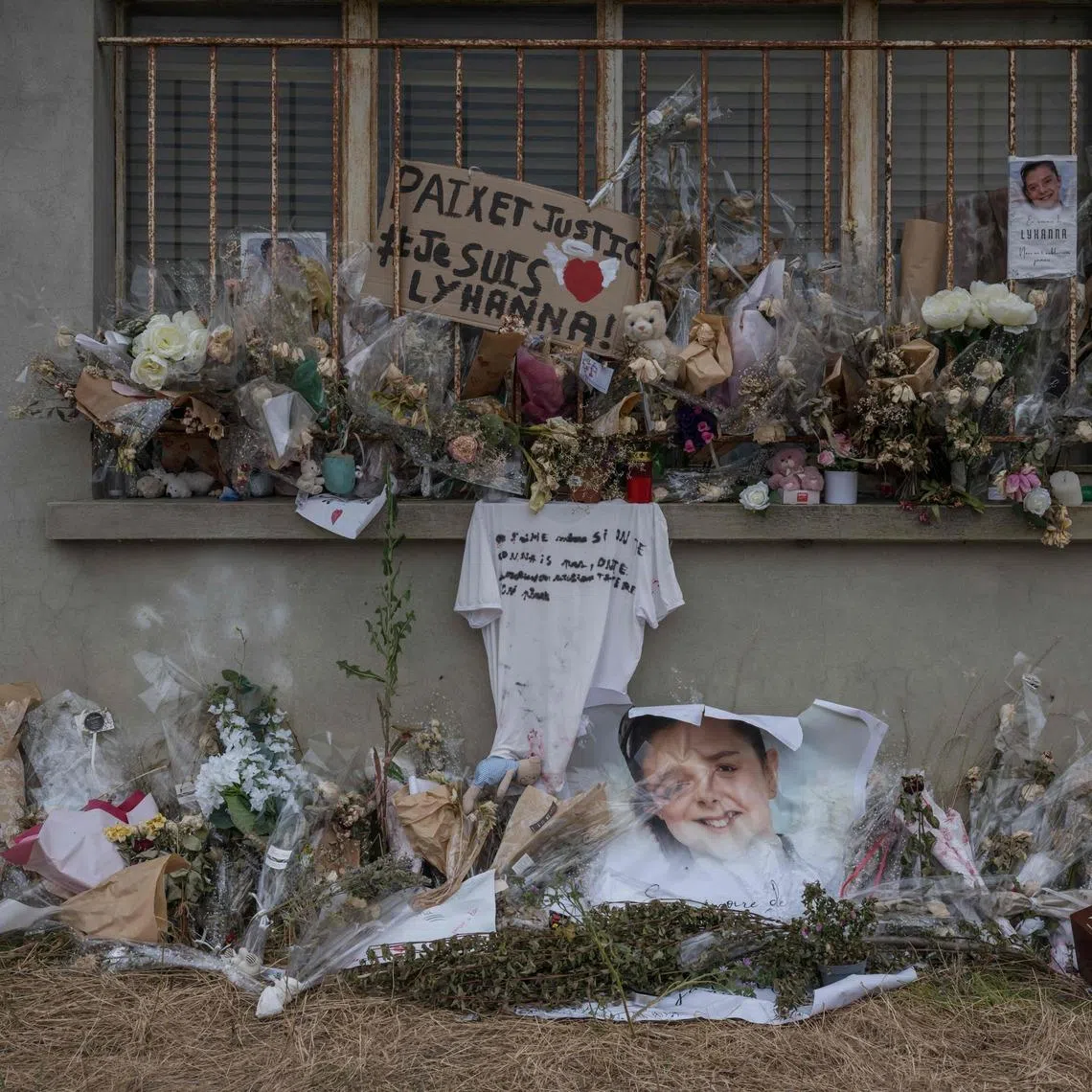 Flowers and tributes were left where the body of Lyhanna, an 11-year-old schoolgirl, was found.