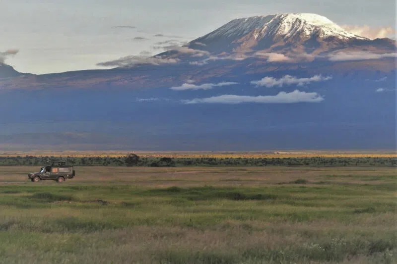 A rare clear view of Mount Kilimanjaro, Amboseli National Park, Kenya.