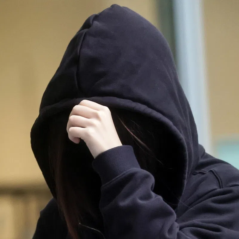 Albee Chai Buo Yin (left) and Klein Kong Yan Kai at the State Courts on Nov 25.