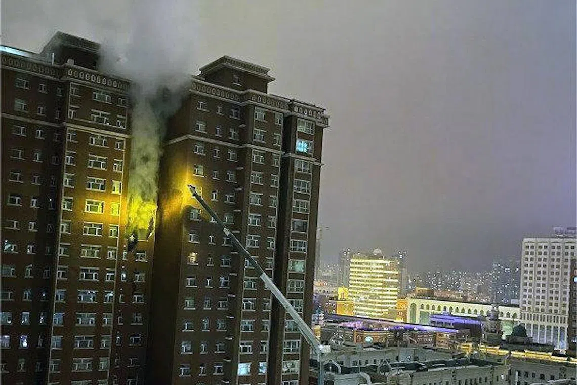 Videos and photos on social media showed firefighters having to hose down the fire from just beyond the perimeter after getting obstructed by barricades.
