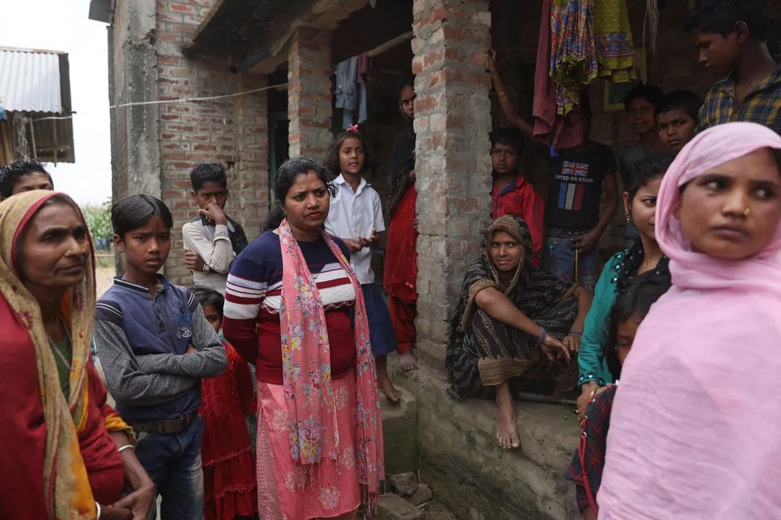 Block Community Mobilizer (BCM) Pratima Kumari, 38 talking about family planning and the different contraceptive methods available in Duadangi village on March 21. "The minute I tell couples to use condoms or suggest permanent birth control, they ignore it or just change the topic," Kumari told Reuters.    